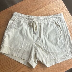 Athleta Farafallon short, light butter yellow color, women’s size medium.